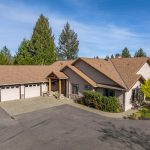 Panoramic view of the luxurious 1030 N Pinnon Rd property, highlighting its lush 5-acre landscape, elegant interior features, and extensive outdoor amenities in Grants Pass, OR.